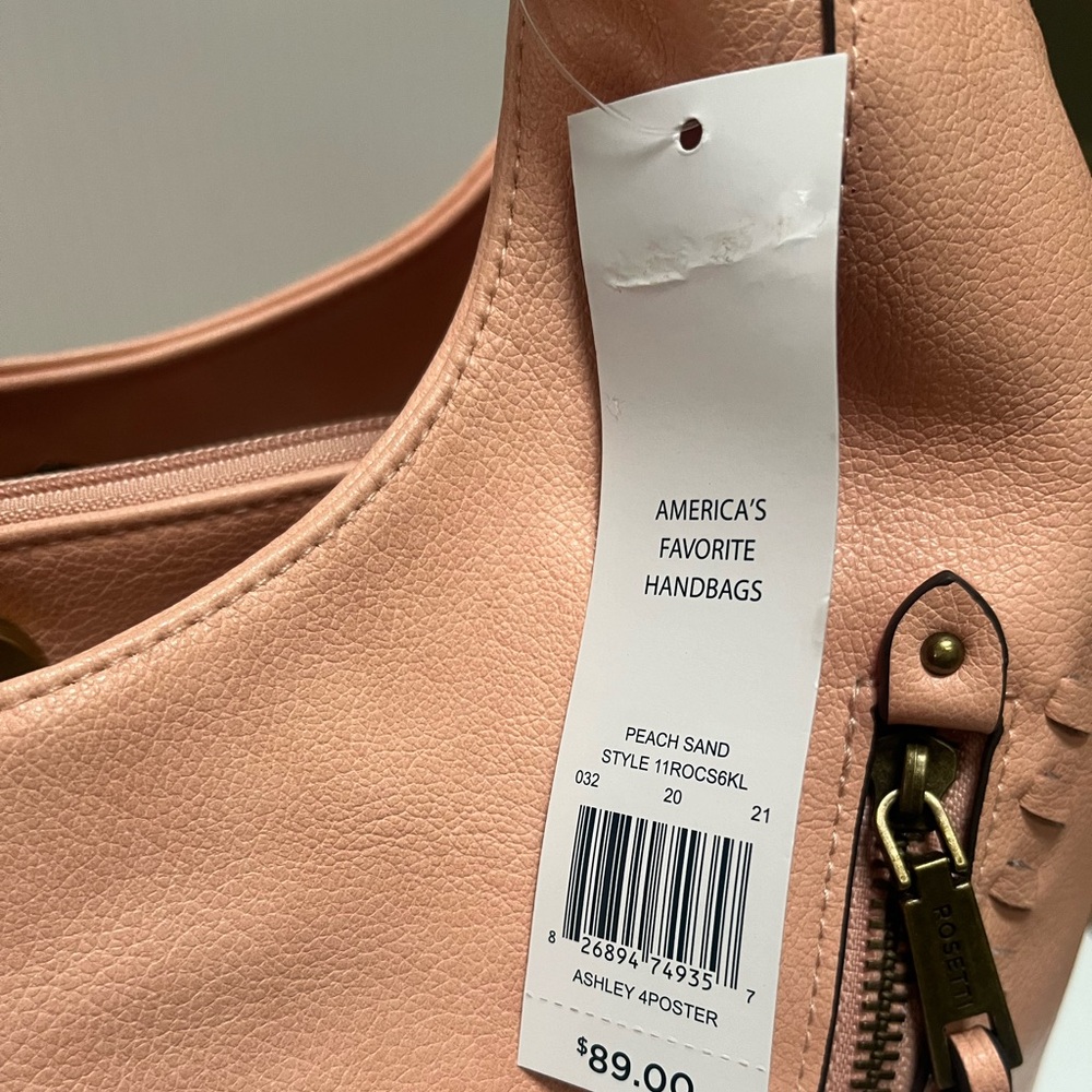 Peach Sand ROSETTI Handbag with multiple zipper for design and space.